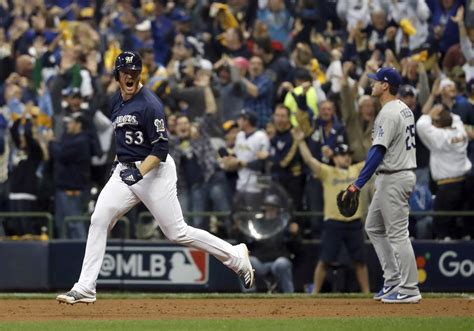 Brewers play the Reds with 1-0 series lead