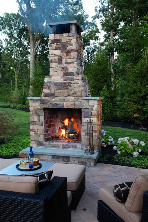 Brick outdoor fireplace. Bring the warmth and traditional style of the FireRock Wood Burning Outdoor Fireplace - 36" to your home. This prefab, modular system fits together to ... 