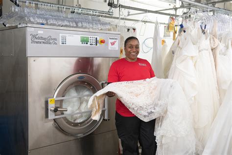 To clean a wedding gown, start by hanging or draping the hem into a bathtub full of warm, sudsy water. If the hem is particularly dirty, use a toothbrush and .... 