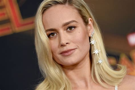 Brie Larson flashes her six-pack abs in a nipple-baring top in new photos. She keeps fit by doing incredibly challenging workout moves like one-armed pull-ups!. Brie larson tits