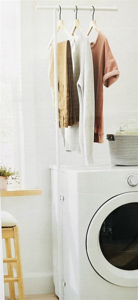 Brightroom magnetic laundry hanging bar. Keep your laundry sorted and organized in modern style with this Magnetic Hanging Bar from Brightroom(tm). This hanging bar is made with metal, and features a thin bar standing on a rod for a sleek design that easily fits anywhere around your home. Designed in a solid white color, this white hanging bar makes an equally stylish and functional addition to your home. Brightroom(tm): See your ... 