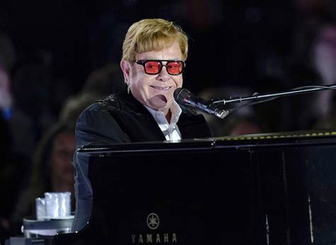 Britain’s Parliament honors Elton John for his work fighting HIV in the UK and beyond