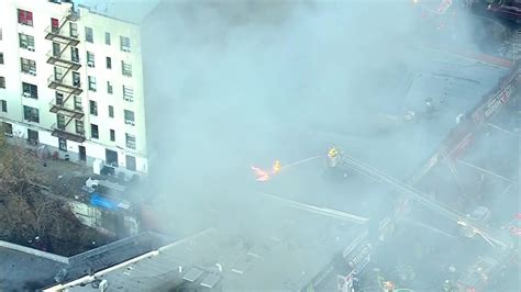 Bronx deli fire sends flames shooting into night sky, one person is treated for smoke inhalation