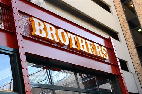 Brothers bar. Brothers is a modernized bar and restaurant throwback to the old Midwestern corner tavern. A clean, relaxed social hangout; our bar stock-full of cold beer and drink with a kitchen in the back serving up comfortable American food fare. 