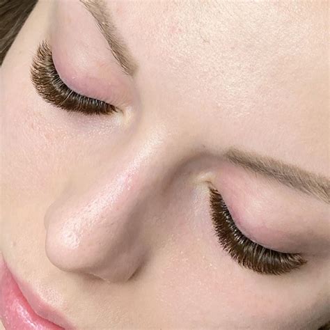 Brown eyelashes. Brown lash extensions are designed to create a natural looking set of eyelashes. The brown pigment mimics a closer shade to natural hairs, this also means growth of the extension on the natural lash is less noticeable. This is ideal for clients who do not have regular infills as the gap is less obvious. Offering brown lashes can attract a ... 