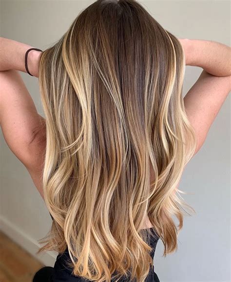 Brown hair and blonde hair. 33 Beach Bum Waves Brown with Blonde Highlights. If you’re looking to step outside your comfort zone, consider contrasting a soft brunette with ashy highlights. To recreate the model’s effortless, beachy vibe, spray your hair down with a sea salt mixture and toussle into waves. The contrast of brown and blonde just … 