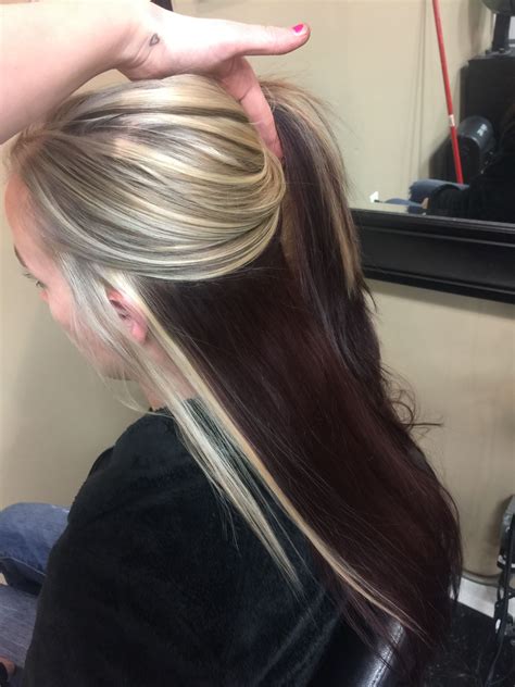 Messy hairstyles such as this one work well with highlights because regardless of how messy the hair gets, the highlights will always add a touch of structure and form to the dark brown base. 22. Cute Ombre Platinum Blonde Highlights in Dark Brown Hair. Source: hairbynathi – instagram.com.