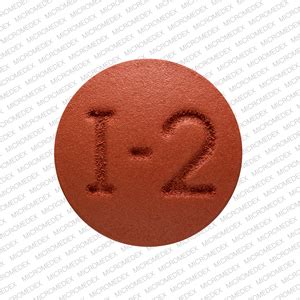 Brown pill with 1 2. Pill Identifier results for "I 2 Brown". Search by imprint, shape, color or drug name. 