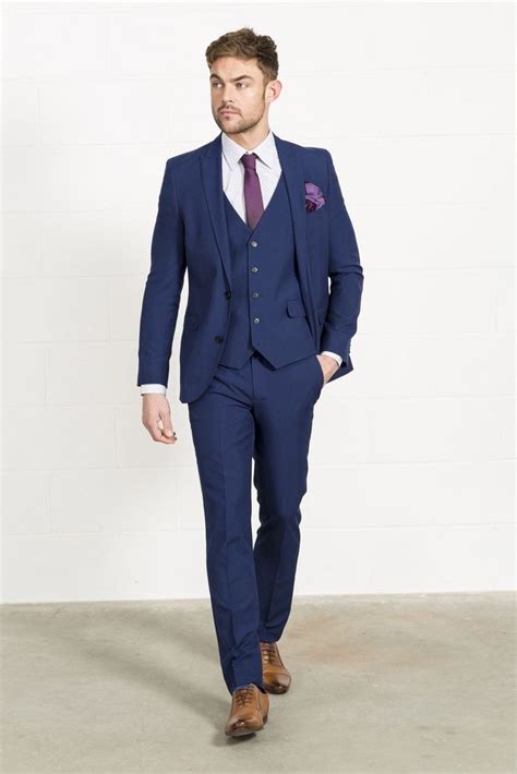 Brown shoes blue suit. A blue suit and brown shoes combination can be just as smart, and a whole lot more versatile than black alternatives. Here we look at the number of ways you can wear the look. 