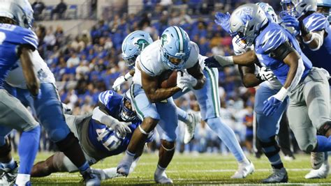 Brown sparks Tulane rally in 31-21 victory over Memphis
