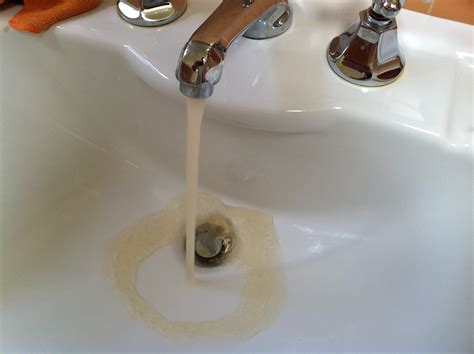 Brown water from faucet. The Spruce / Adrienne Legault. Remove the Aerator . Grip the aerator with your hand and unthread it counterclockwise (when viewed downward from above) to remove it from the end of the faucet spout. If the aerator is stuck and won't turn, use a pair of pliers, preferably channel-lock pliers, to carefully loosen it.Do not squeeze the pliers too hard or … 