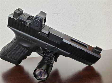 Slide serrations wrap around both the front and rear of the slide which is also cut for standard Glock sights and Trijicon RMR-patterned optics. A striker channel liner needs to be installed, but .... 