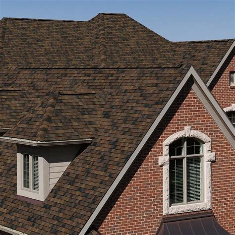 Brownwood shingles. There are 29 shingles in a standard bundle of three-tab roofing. Each shingle is 12 inches by 36 inches. It takes three bundles to make a square, which in roofing is 100 square fee... 