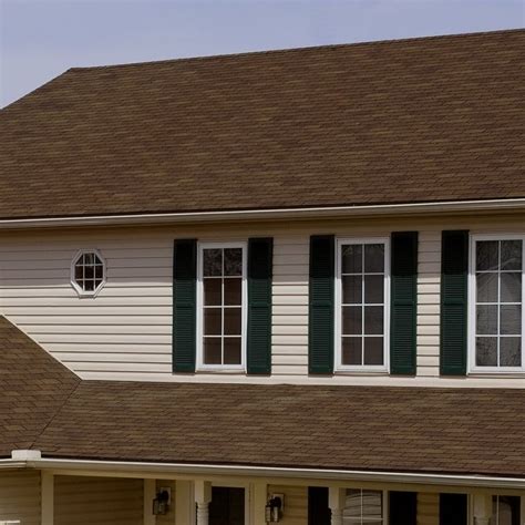 Also, when the roof color picks up tones in window shutters, the front