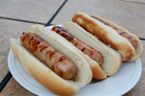 Brrats - Place brats in a Dutch oven with onions and butter, cover the brats with beer. Bring to a boil and reduce to simmer until brats are cooked. Remove brats and set aside beer mixture. Grill brats ...