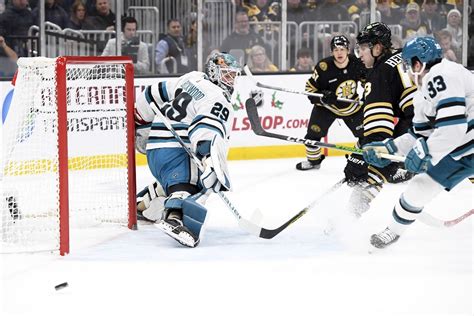Bruins end skid with 3-0 win over Sharks