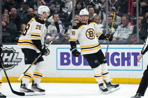 Bruins explode for four second period goals, beat Devils 5-2