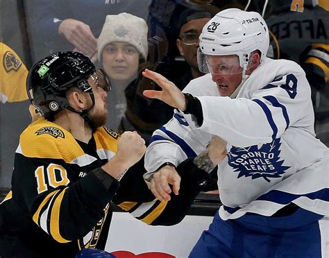 Bruins keep winning, defeating Toronto in OT, but lose Charlie McAvoy to injury