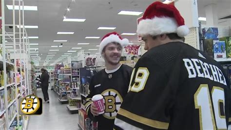 Bruins players hit the shopping aisles for gifts to give to children at local hospitals