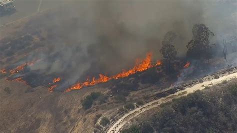 Brush fire breaks out in East County, prompts road closures