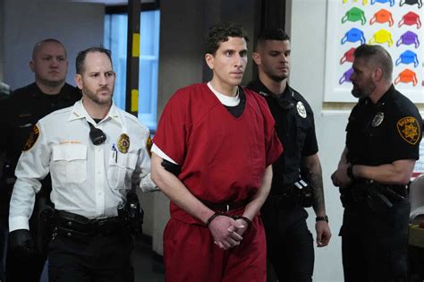 Bryan Kohberger, center, who is accused of killing four University of Idaho students in November 2022, sits with his attorneys, Anne Taylor, left, and Jay Logsdon, at a hearing in Latah County ...