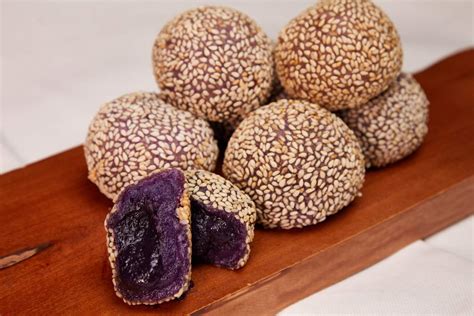 Buchi. Buchi or Sesame balls are deep fried rice cake that are fully covered with crispy sesame seeds. Traditionally filled with sweet red mung beans but I find Ube tastes way better. Also, the sweet mung beans takes forever to cook. Though, you have the option to purchase a ready made one in can which is normally available at an Asian market. 