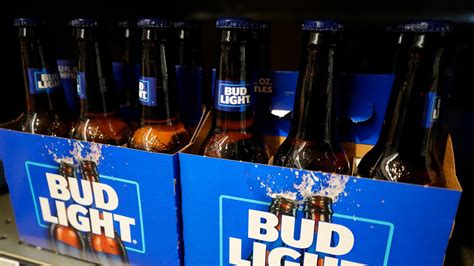 Bud Light maker Anheuser-Busch lays off hundreds of US corporate workers after sales slump