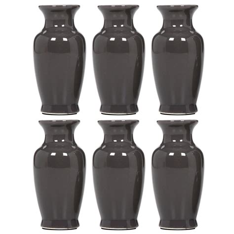 Bud vases amazon. Sullivans Ceramic Vase Set. Now 14% Off. $30 at Amazon $35 at Home Depot $36 at Overstock. Credit: Amazon. Make a statement with these matte black ceramic vases. Since the set comes with three vases of different heights, it's easy to style them together, and pick the best size for whatever fresh flowers you bring home. 
