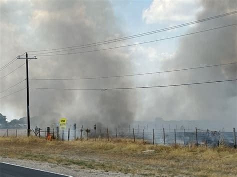 Buda wildfire under control, officials say