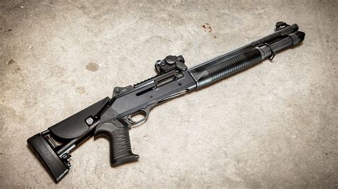 JTS M12 AR. NEW. $499.99. Standard mags hold five shells, but you have the option of upping that with larger JTS or Saiga magazines. (Photo: Paul Peterson/Guns.com) My particular M12AK came with ...
