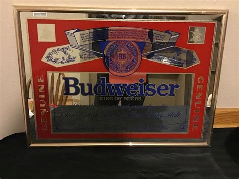 Budweiser mirror price guide. Budweiser frog mirrored glass wall hanging in NOS original unopened packaging 1995 This item measure 16 1/2 by 20 1/2 . There are a couple of very faint thin marks or flaws in the mirror that measure 
