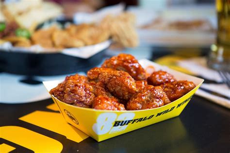 BUFFALO WILD WINGS® ALLERGEN & PREPARATION GUIDE PAGE 2 OF 7 VALID 5/31/2023 THROUGH 8/15/2023 ©2023 BUFFALO WILD WINGS, INC. BAR FOOD Asian Zing® Cauliflower Wings x • • • • • Buffalo Chicken Tots x • • Cheddar Cheese Curds, with Southwestern Ranch Dressing x • • • • Chips & Dip Trio x • Chips & House-made …. 