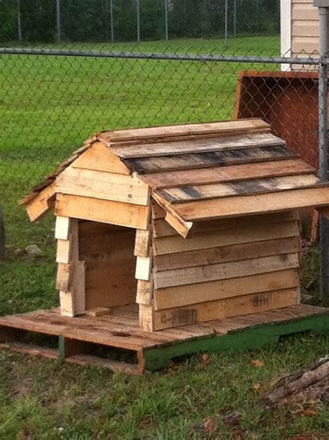 Build dog house pallets. Now depending on the size of your dog cut the platform legs which should be ideally six inches long. Now you can round the bottom of the platform legs. Now you should along the tops of the dog house and nail the legs flush against the edges in the inside area of the platform. How to Build A Cool Pallet Dog House via 101 Pallet Ideas. 