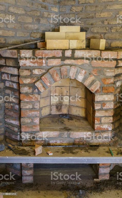 Building a Fireplace in a House Using Old Bricks. Beautiful Bricklaying