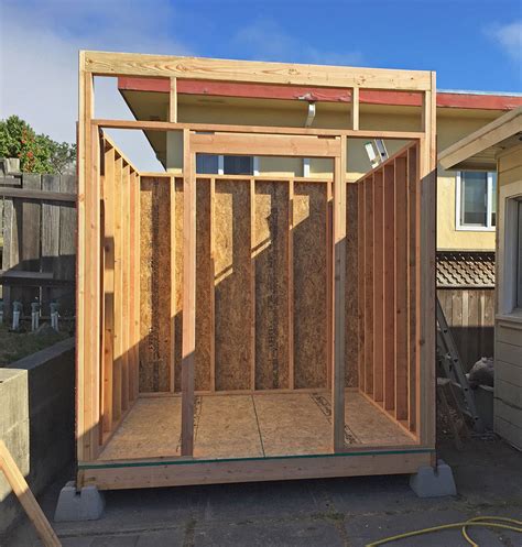 Building a Shed from Scratch Installing Siding and Building a Roof