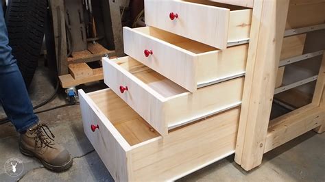 Building drawers. With inset, you take the inside dimensions and subtract ⅛″ gaps, but with full overlay, you take the outside dimensions and subtract ⅛″ reveal. The reveal is the part of the frame left exposed after the overlay. With 29″ of available drawer front space, I can divide it out among my drawers however I’d like. 