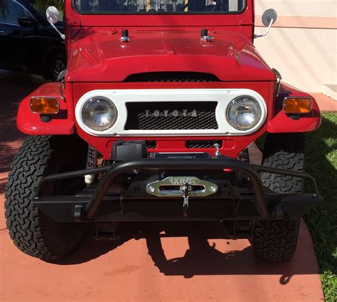 IPOR FJ40 Toyota Land Cruiser Rear Bumper. Built with durable good looks, the IPOR FJ40 Rear Bumper is tough enough to withstand the rigors of off road use, yet refined enough to look good around town. Computer designed and laser cut from 1/4" plate steel, the FJ40 Bumper is available with modular swing out systems custom tailored to your …. 