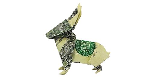 Money Rabbit Origami Dollar Animal Craft Tutorial DIY Folded No glue Money rabbit is a great gift for any occasion. Money craft origami will not leave anyone indifferent! Tutorial only folded without using glue. Origami made of $ 1. If you wish, you can decorate Bunny colored ribbon. I wish you pleasant viewing!.