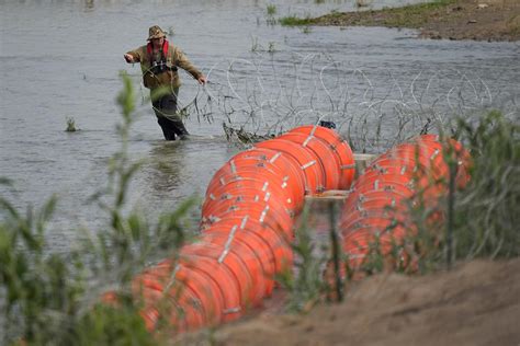 Buoys to be deployed as new barrier at Texas border, Abbott says