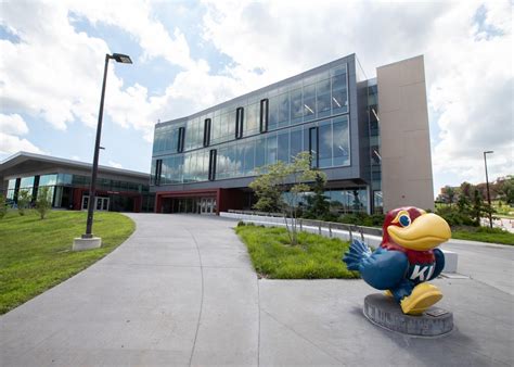 photo by: Mike Yoder The new 33,000-square-foot Burge Union at KU, center left, will open April 2, 2018. At right is the Integrated Science Building, which is projected to be open this summer.. 