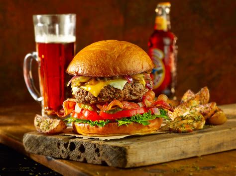 Burger and beer. Backyard burger. What could be more classically American than a standard juicy … 