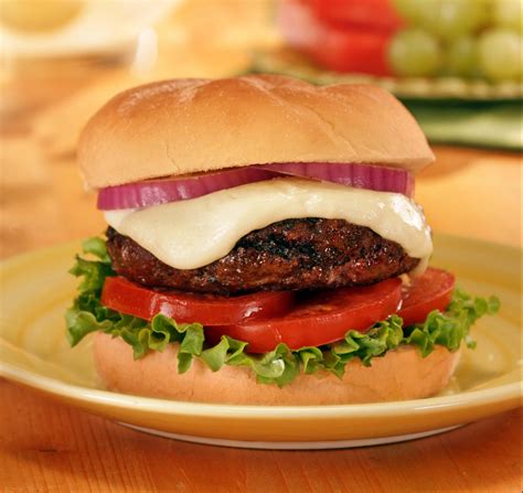 Burger fresh. Grill your burgers about 4min on the first side. Cook until you reach the correct temp (140F for medium), usually about 2 to 4 minutes. Add cheese about a minute before you pull the burgers off the grill. Optional: Add ketchup & mayo (about 50/50) to the bottom of the bun. 