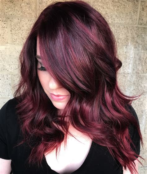 There are many tones of burgundy so that every woman can find the most flattering shade for her complexion. ADVERTISEMENT. Usually, a cool burgundy hair color that includes much violet and red will compliment women with ebony, olive, or pink complexions. And a warm burgundy hair color will work for women who have golden or peachy skin tones.. 