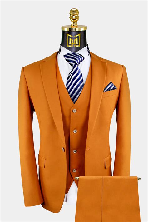 Burnt orange suit. A slim fit burnt orange velvet blazer with black satin peak lapels. 
