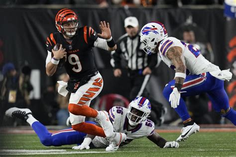 Burrow passes for 348 yards and 2 TDs and Bengals’ defense clamps down on Bills in 24-18 win