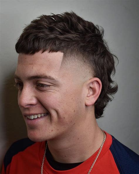 Looking for a bold and unique hairstyle that'll give you an edgy look? Look no further than the burst fade mullet! This popular haircut combines the classic .... 