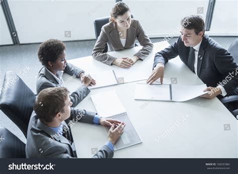 Business People Sitting Around Table Pictures, Images …