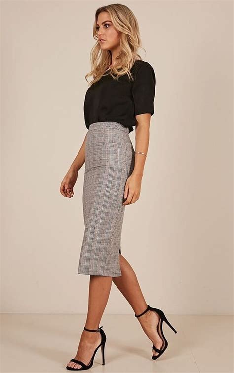 Business casual skirt. For women, a spiffy sweater over a tailored skirt (knee-length or longer) or slacks with a low heel pump or a dressy flat, all topped with an elegant silk scarf. The look still says business ... 