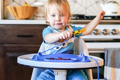 Busy baby mat. Parents REJOICE! Busy Baby has a line of products that keep baby's things within reach and off the floor at home and on the go. Made with 100% food-grade silicone, the products are durable, easy to clean, and safe for babies to eat from and chew on. Placemats, Bungees, Bibs and more. 