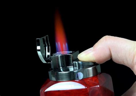 Step 1. Press the ignition button or slide the cover, as required, to release butane gas into the burner chamber. Listen for the hiss of the gas as it leaves the …